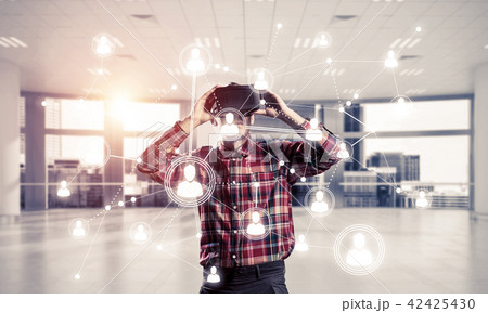 Guy wearing checked shirt and virtual mask demonstrating some emotions Guy wearing checked shirt and virtual mask demonstrating some emotions 42425430