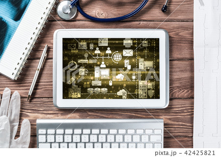 Concept of modern medicine with tablet on wooden table from top view 42425821