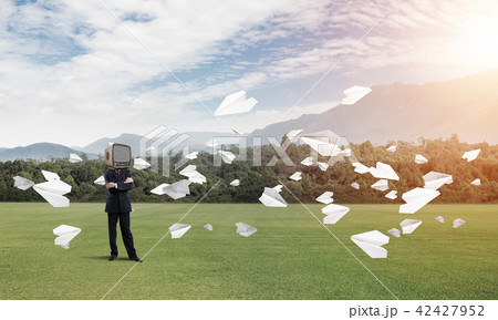 Businessman with old TV instead of head. 42427952