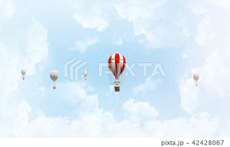 Flying hot air balloons in the air. 42428067