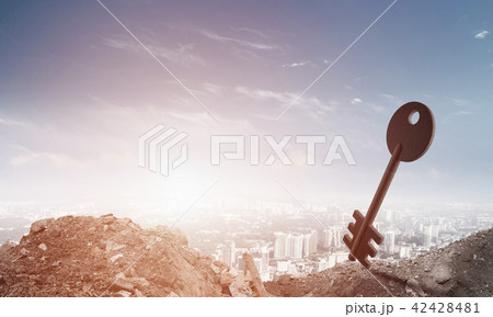 Conceptual background image of concrete key sign and natural landscape 42428481
