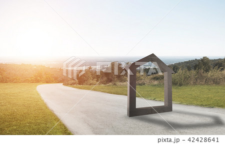 Conceptual background image of concrete home sign on asphalt road Conceptual background image of concrete home sign on asphalt road 42428641