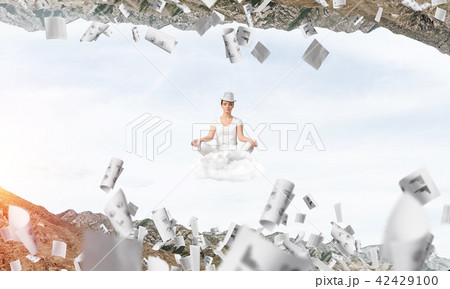 Young woman keeping mind conscious. Young woman keeping mind conscious. 42429100