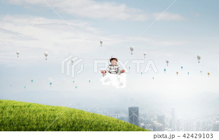 Young boy keeping mind conscious. Young boy keeping mind conscious. 42429103