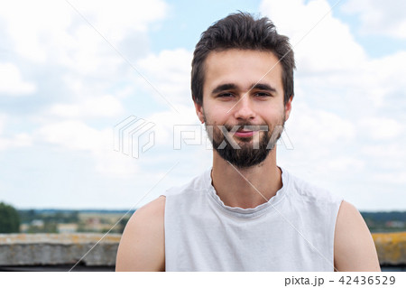 Portrait of a young man with a beard close-up Portrait of a young man with a beard close-up 42436529