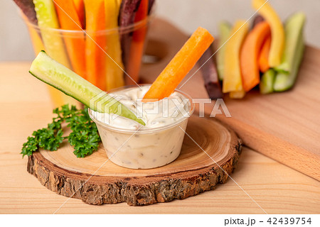 carrots and cucumbers vegetables sliced in stripes 42439754
