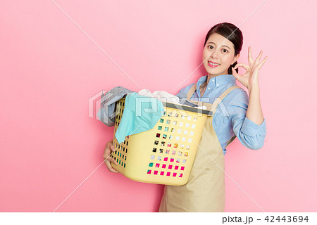 housewife showing the ok hand gesture housewife showing the ok hand gesture 42443694