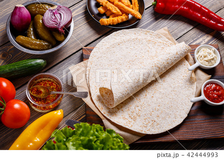 Ingredients for preparing mexican food, tortilla. 42444993