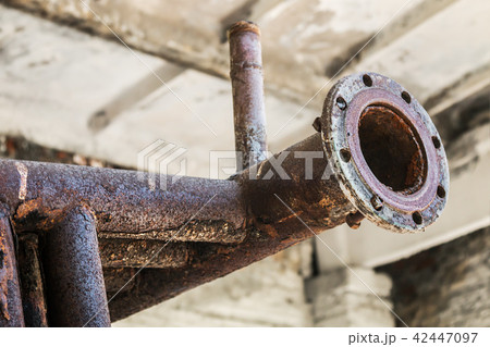 old rusty pipes in the destroyed boiler room old rusty pipes in the destroyed boiler room 42447097