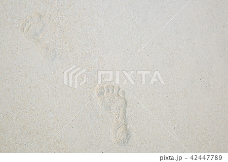 Close Up of bare feet walking and footprint Close Up of bare feet walking and footprint 42447789