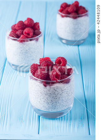 Chia pudding in glass with raspberry 42448109