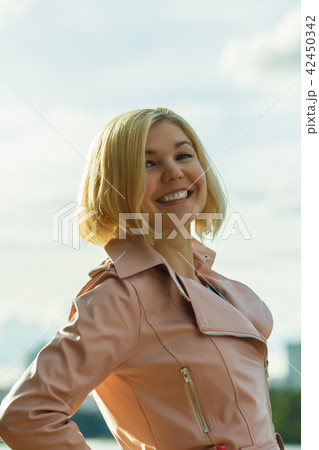 Portrait of woman in park 42450342