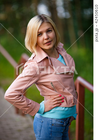 Portrait of woman in park 42450610