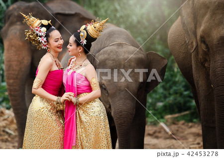Pretty thai girls in traditional thai costumes 42453278