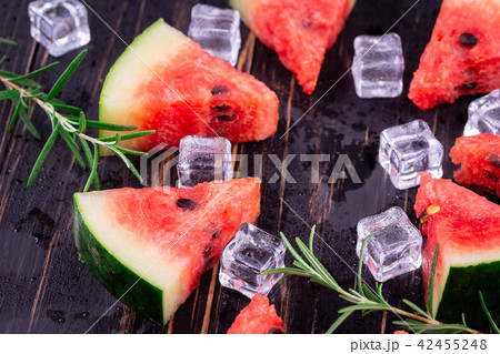 watermelon on wooden background 42455248