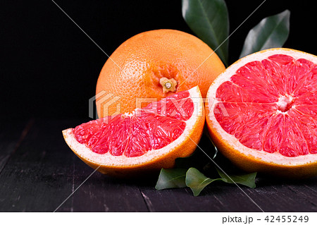 orange and grapefruit juice On a wooden 42455249