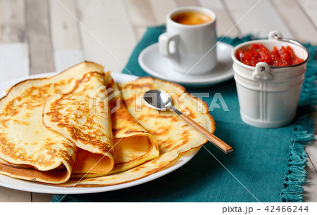 Pancakes with jam and Espresso 42466244