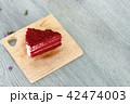 Delicious Red velvet slice cake on wood board 42474003