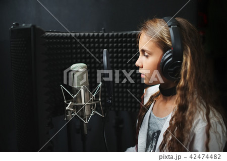 little girl singing in recording studio little girl singing in recording studio 42474482