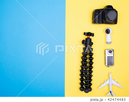 Flat lay top view of plane on yellow background Flat lay top view of plane on yellow background 42474483
