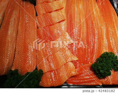 Salmon fillets frozen on ice Salmon fillets frozen on ice 42483182