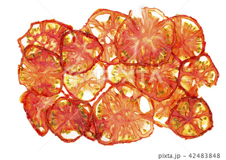Sun-dried (dried) tomatoes closeup Sun-dried (dried) tomatoes closeup 42483848
