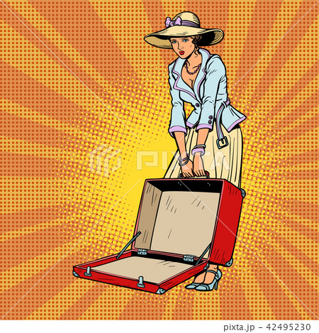 Woman with open suitcase 42495230