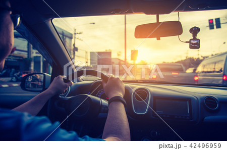 people driving car on day time. 42496959