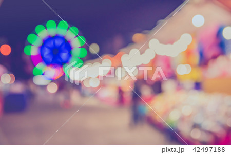 blur theme park on night time. 42497188