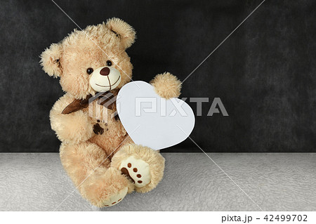 Teddy bear with hearts  42499702