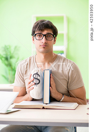 Young student in expensive tuition concept Young student in expensive tuition concept 42503950