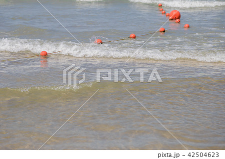 Red buoys in the open sea on a sunny day. Red buoys in the open sea on a sunny day. 42504623