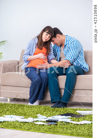 Young family in budget planning concept 42510698