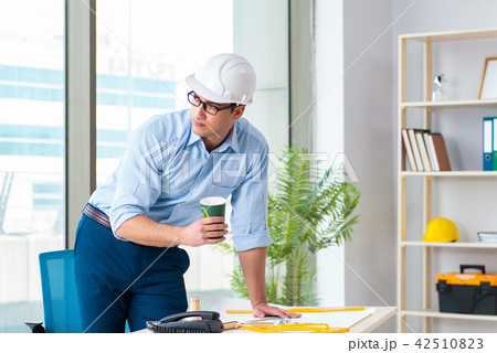Construction engineer working on new project Construction engineer working on new project 42510823