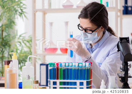 Female chemist working in hospital lab 42510835
