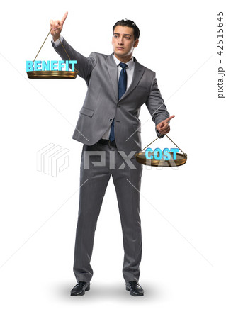 Businessman in cost benefit balance concept Businessman in cost benefit balance concept 42515645