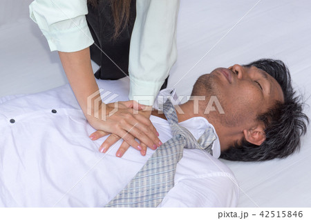 First Aids Emergency CPR on Heart Attack Man 42515846
