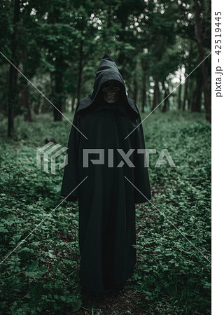 Death in black hoodie in forest Death in black hoodie in forest 42519445