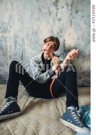 Male druggy with syringe doing an injection dose Male druggy with syringe doing an injection dose 42519586