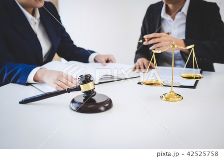 Teamwork of business lawyer colleagues, consultation and confere Teamwork of business lawyer colleagues, consultation and confere 42525758