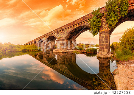 Overview at sunset of the Ancient Bridge of Orosei 42527558