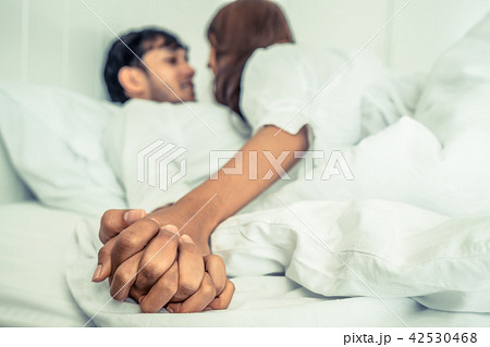 Romantic love of young couple in the bedroom. Romantic love of young couple in the bedroom. 42530468