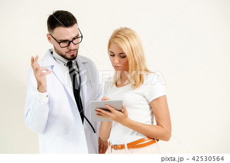 Male Doctor and Female Patient in Hospital. 42530564