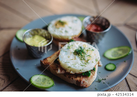 Plate with morning breakfast on the table Plate with morning breakfast on the table 42534314