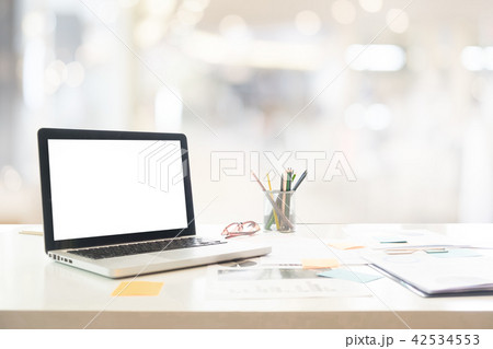 Workspace with computer on white table in office. Workspace with computer on white table in office. 42534553