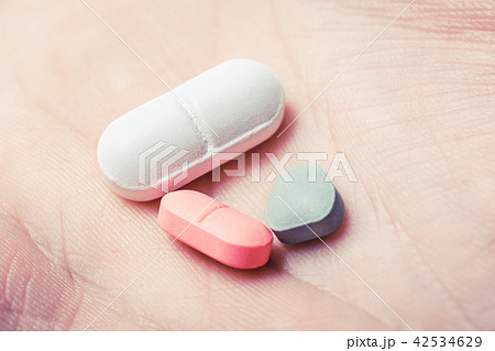 Three Pills In The Middle Of A Hand Three Pills In The Middle Of A Hand 42534629