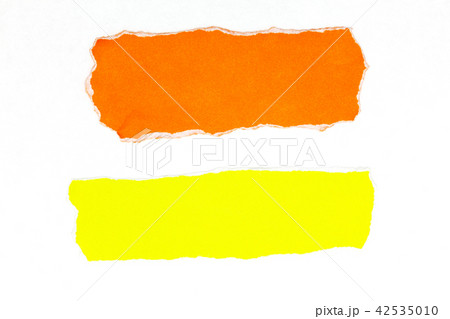 Orange and yellow torn paper on white background. Orange and yellow torn paper on white background. 42535010