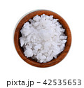 Salt in wood bowl on white background 42535653