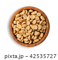 Raw coffee beans in wood bowl 42535727