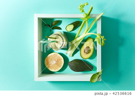 Vegetable smoothies from avocado, asparagus, spinach, cucumber, celery with flax seeds in square Vegetable smoothies from avocado, asparagus, spinach, cucumber, celery with flax seeds in square 42536616